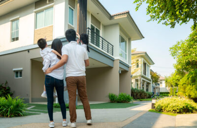 family of four looking up at home